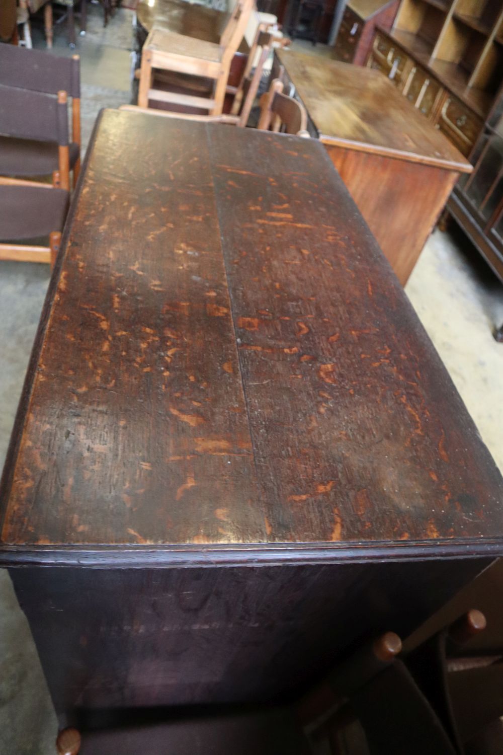 A George III oak chest of drawers, width 109cm depth 54cm height 102cm